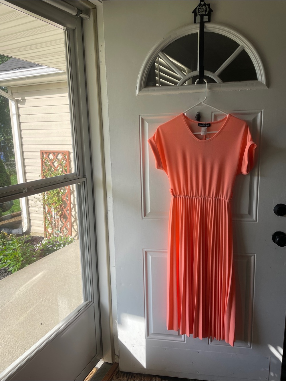 Juniors’ Bright Coral Pleated Dress